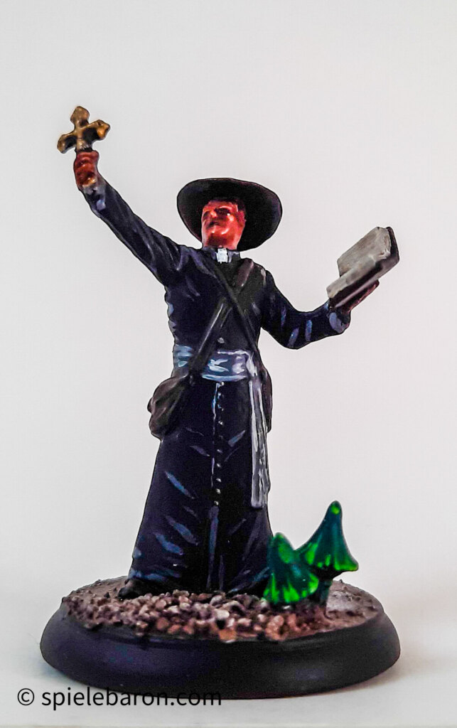 Showcase Foto zu Shadows of Brimstone, bemalte Figuren: Preacher auf Mine Bases vor weißem Hintergrund